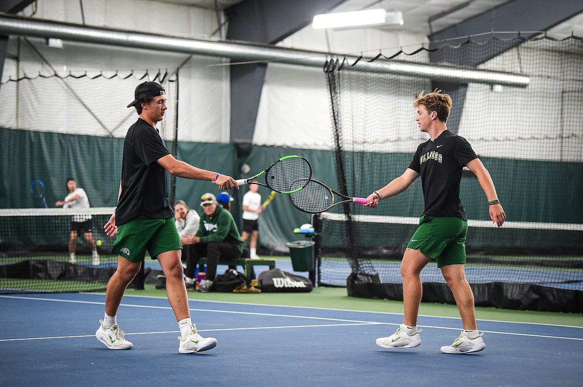 Whitefish's boys doubles pairing of Mason Kelch and Dane Hunt tap rackets as they take on Billings Central's Braydon Petermann and Aiden Sorenson at the Class A State Tennis Tournament at Logan Health Medical Fitness Center on Friday, May 24. (Casey Kreider/Daily Inter Lake)