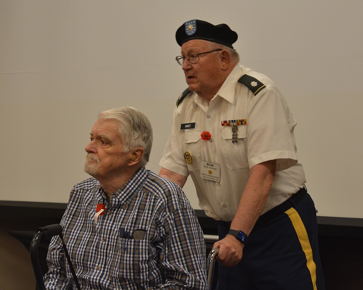 John Goldsmith is applauded by the crowd at the Rotary Club luncheon for speaking about his son, Wyatt Goldsmith, who was killed in combat in Afghanistan in 2011.
Goldsmith and Bob Smee wear poppies to commemorate National Poppy Day to honor the fallen and support the living who have worn our nation's uniform.