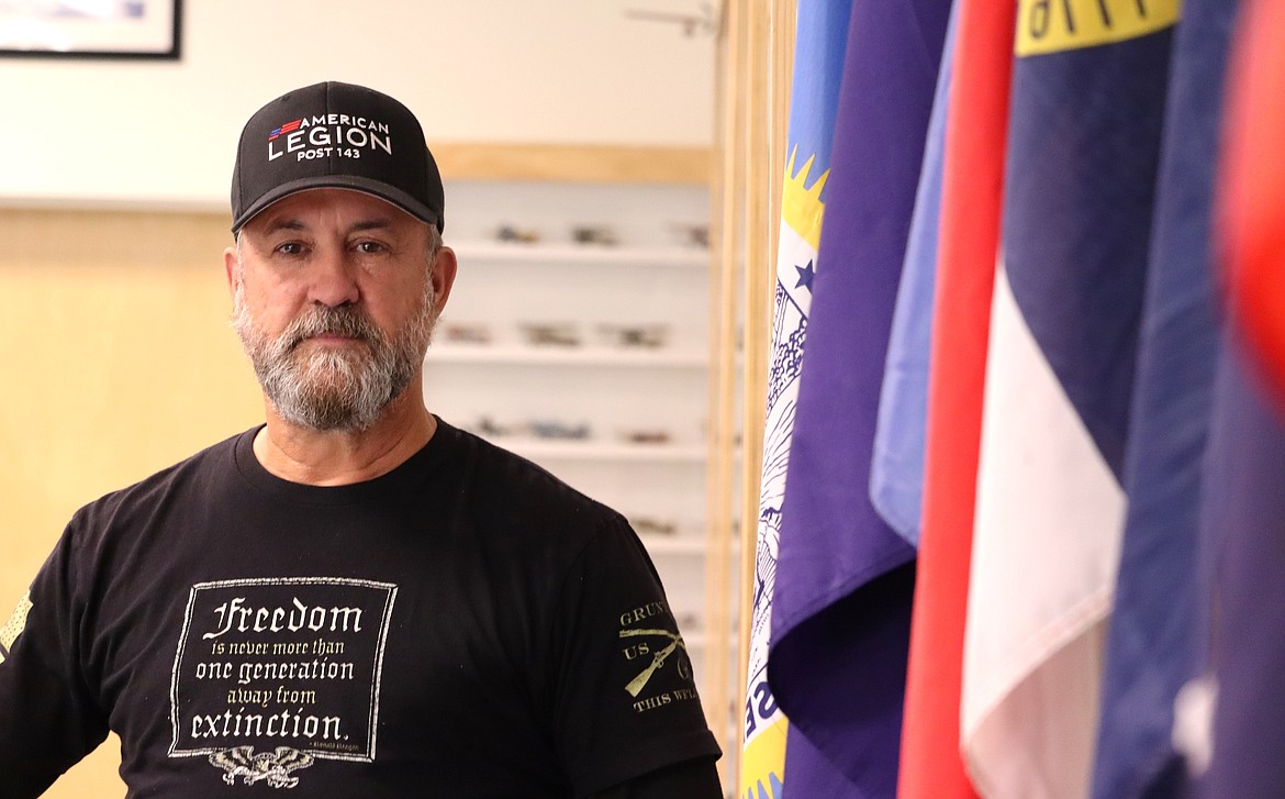 Veteran Stephen Godfrey stands in the Post Falls American Legion Post on Friday as he reflects on his military career.