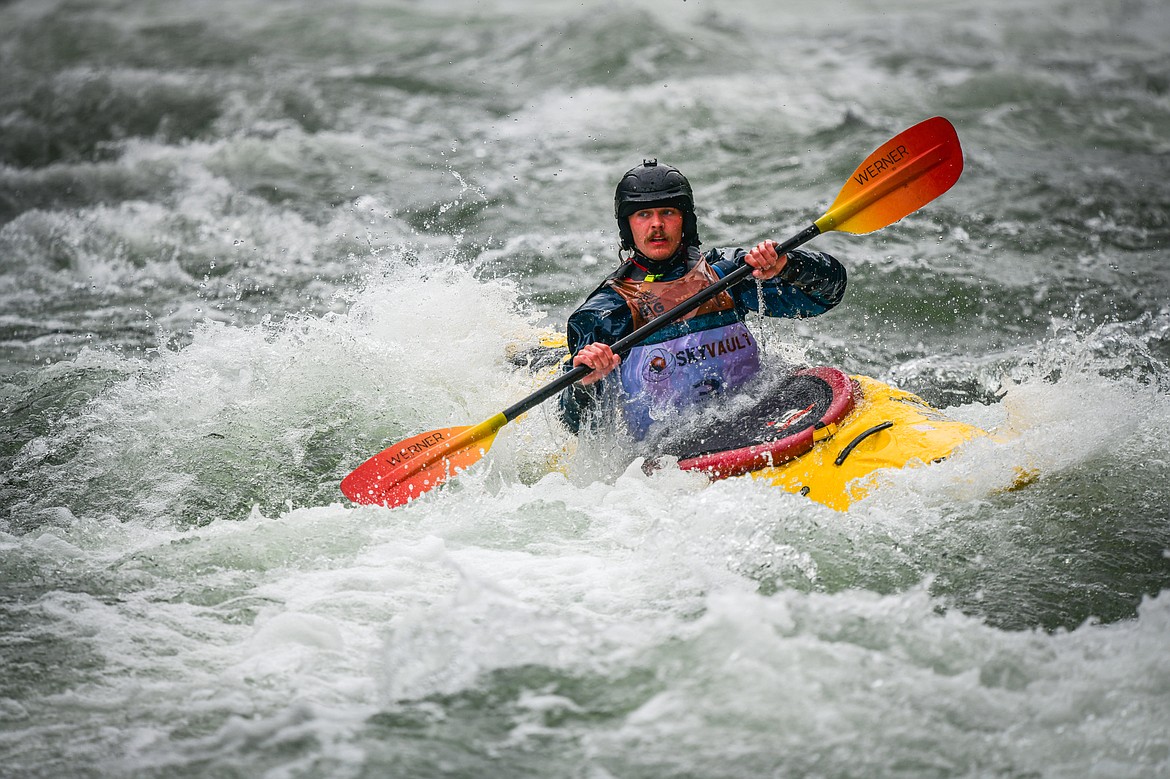 Kayakers navigate a section of the Wild Mile on the Swan River during the Expert Slalom event at the Bigfork Whitewater Festival on Saturday, May 25. (Casey Kreider/Daily Inter Lake)
