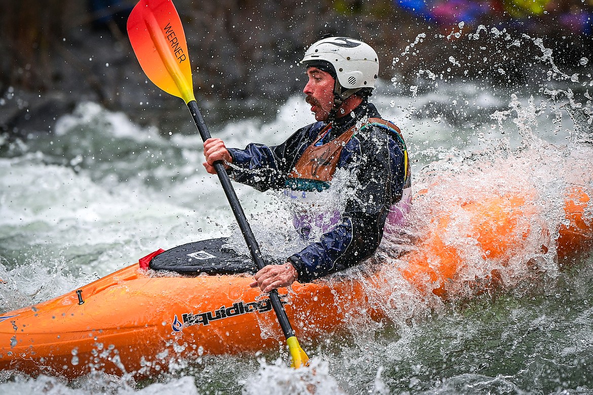 Kayakers navigate a section of the Wild Mile on the Swan River during the Expert Slalom event at the Bigfork Whitewater Festival on Saturday, May 25. (Casey Kreider/Daily Inter Lake)