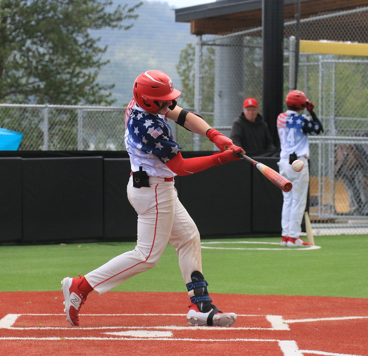 MAX OSWALD/Bonner County Daily Bee
North Idaho Laker Jorden Tyler rips a ball to deep center field for a triple during their season opener on Saturday against Moscow at War Memorial Field.