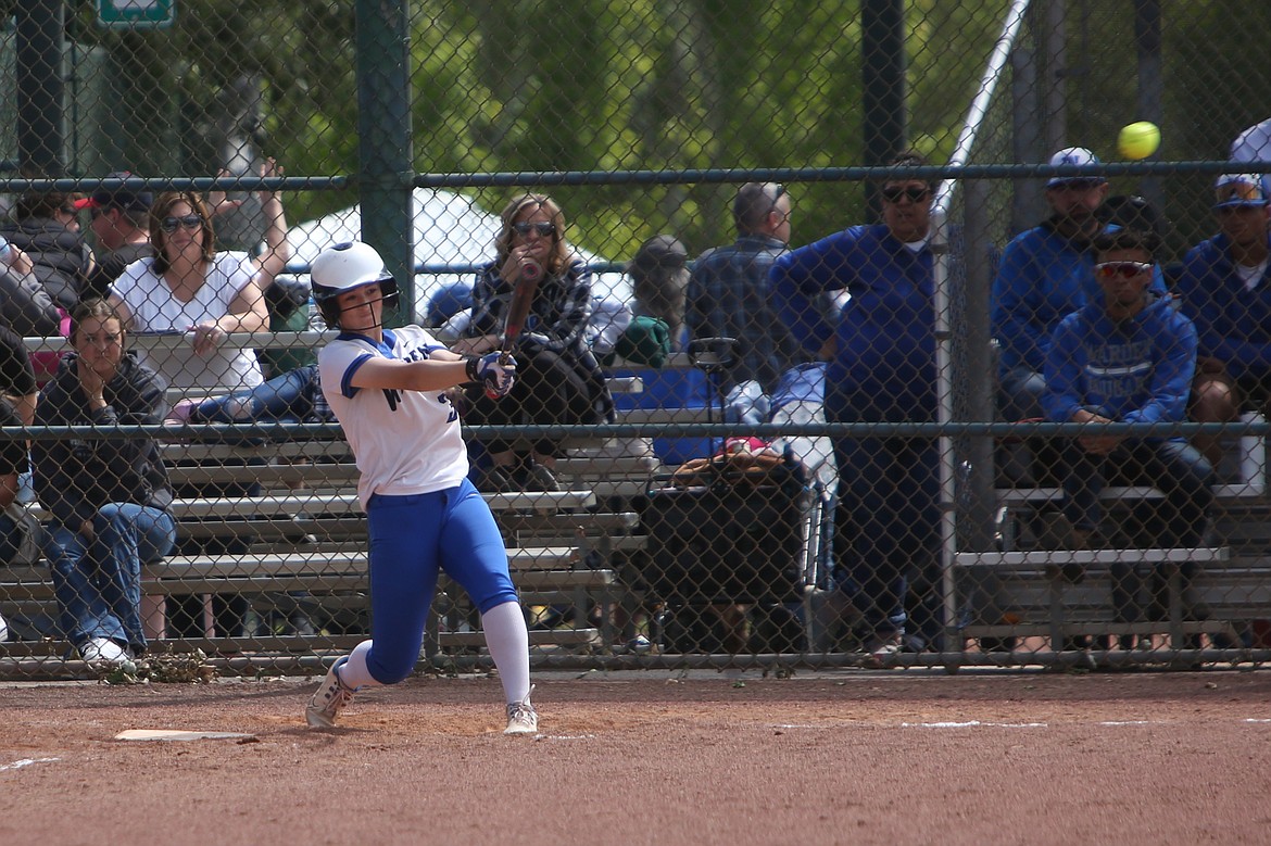 Warden senior Brianalee Martinez delivers an RBI single in the bottom of the fifth inning against Lind-Ritzville/Sprague in the opening round of the 2B State Softball Tournament on Friday.