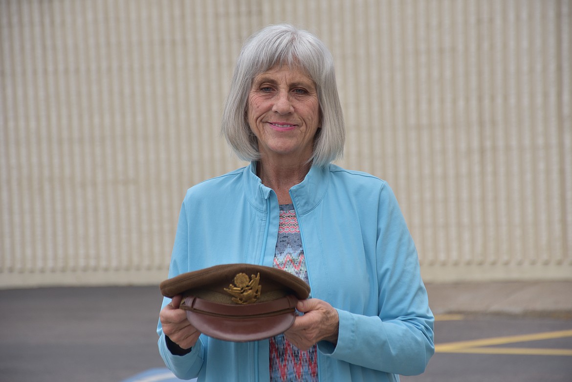 Janice Sterner Jones of Kalispell holds the officers hat that belonged her uncle, 1st Lt. Jack McWilliams. A resident of Somers, McWilliams was shot down in Europe in January 1945. (Heidi Desch/Daily Inter Lake)