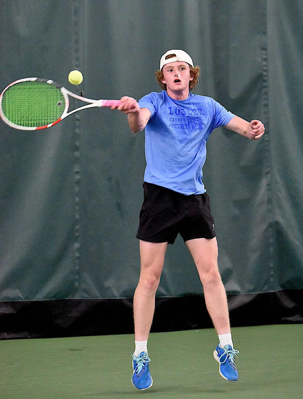 Libby's Ryan Beagle hits a forehand shot against Polson's Torin Ellis in the state Class A singles championships Friday, May 24, 2024. (Scott Shindledecker/The Western News)