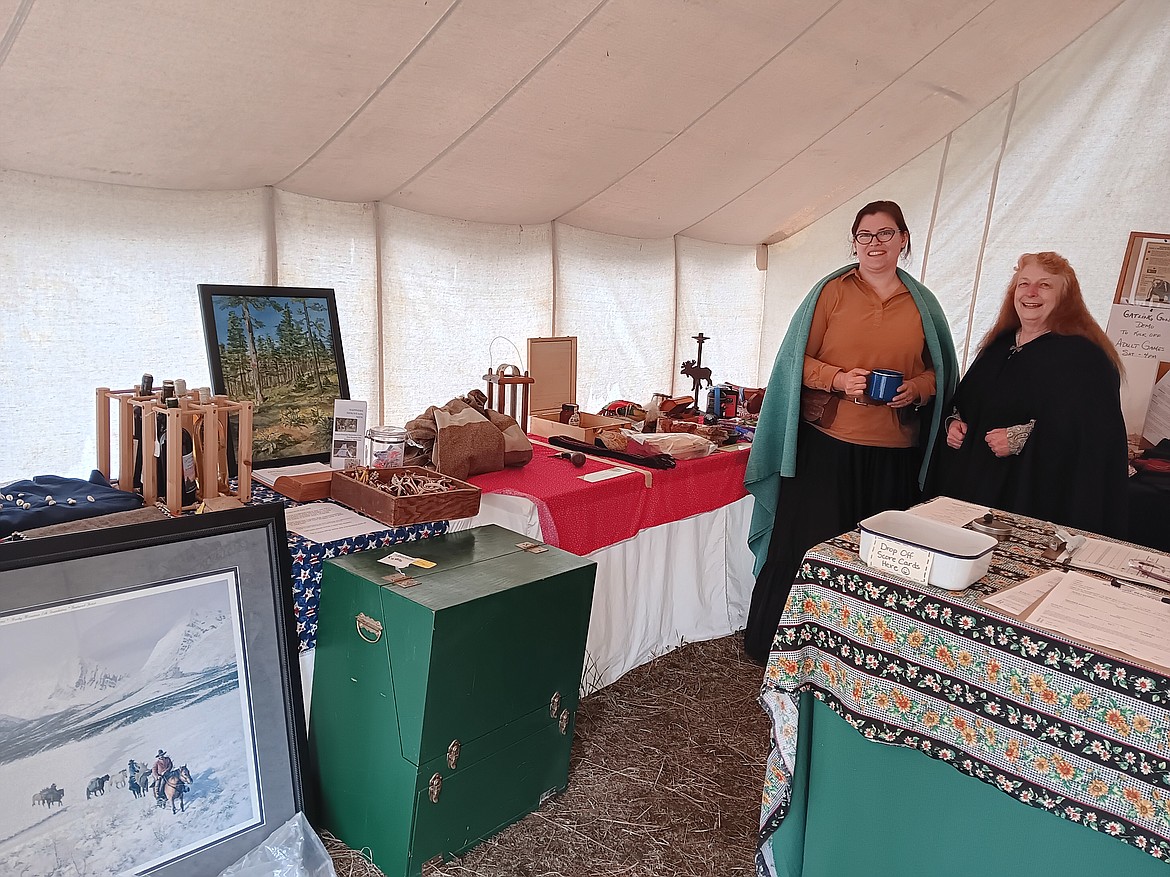 Andrea Crosier from Stevensville and Beca Sue from Charlo, Montana managed registration and collected the prizes for the raffle and contest winners for the three days. (Monte Turner/Mineral Independent)