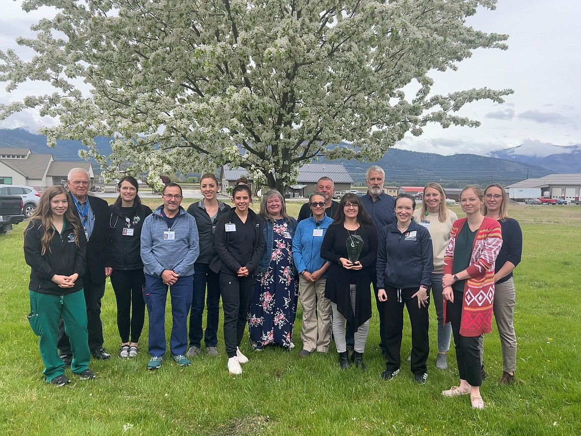 Clark Fork Valley Hospital care team pictured with the Stroke Hero Award at a training put on by Kurt Lindsay and Logan Health Telestroke team.