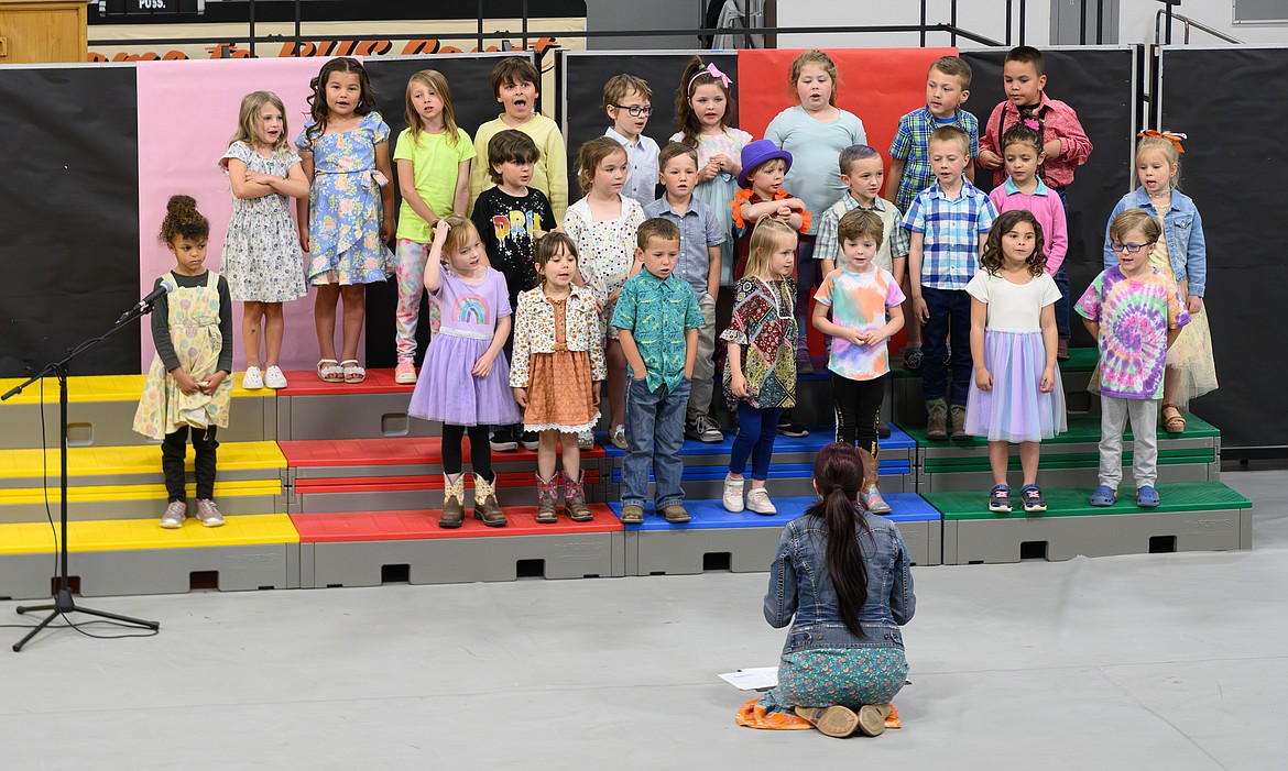 Kindergarten class sings "I like to have fun" during the Plains Elementary spring concert with music teacher Nichole Cockrell. (Tracy Scott/Valley Press)