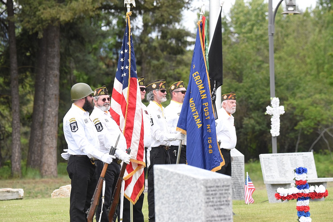 Members of the Libby VFW Post 1548 Color Guard participated in a Memorial Day program on May 27, 2024, at River Front Park in Libby. (Scott Shindledecker/The Western News)