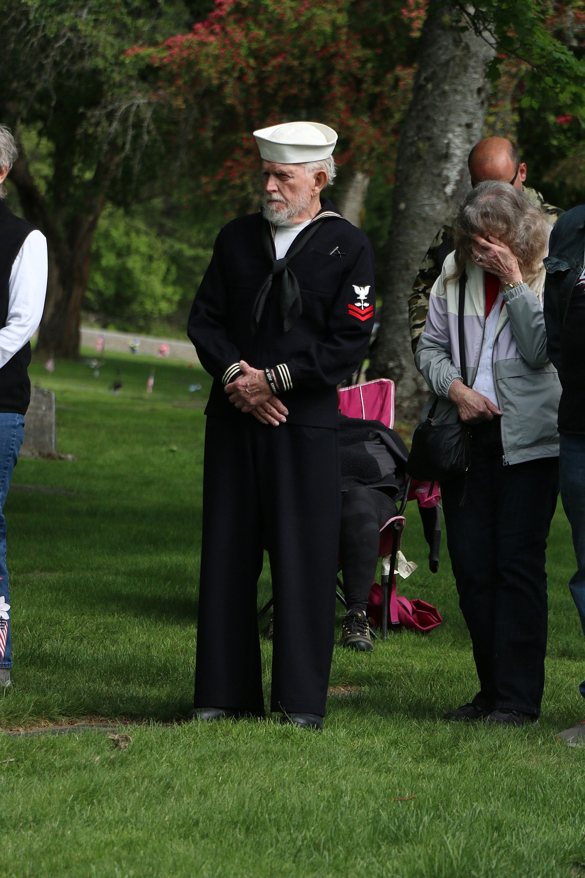 Thomas Spade, wearing his uniform from when he served in the U.S. Navy, attends Monday's Memorial Day ceremony at Pinecrest Cemetery.