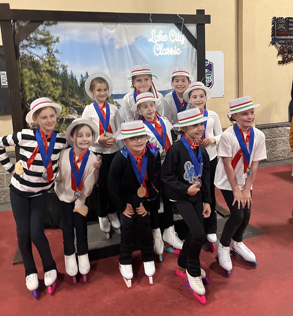 Courtesy photo 
The Shooting Stars, Theatre on Ice. In the front row from left are Brynna Sommer, Katherine De La Rosa, Ivy Barkley, Paisley Kelley and Kaley Nelson; second row from left, Annika Wallace and Chloe Glass; and back row from left, Felicity Scott, Ella Perry and Constance Scott. All are part of the Lake City Figure Skating program of the Spokane Figure Skating Club, which hosted the Lake City Classic on May 17-19 at the Frontier Ice Arena in Coeur d'Alene.