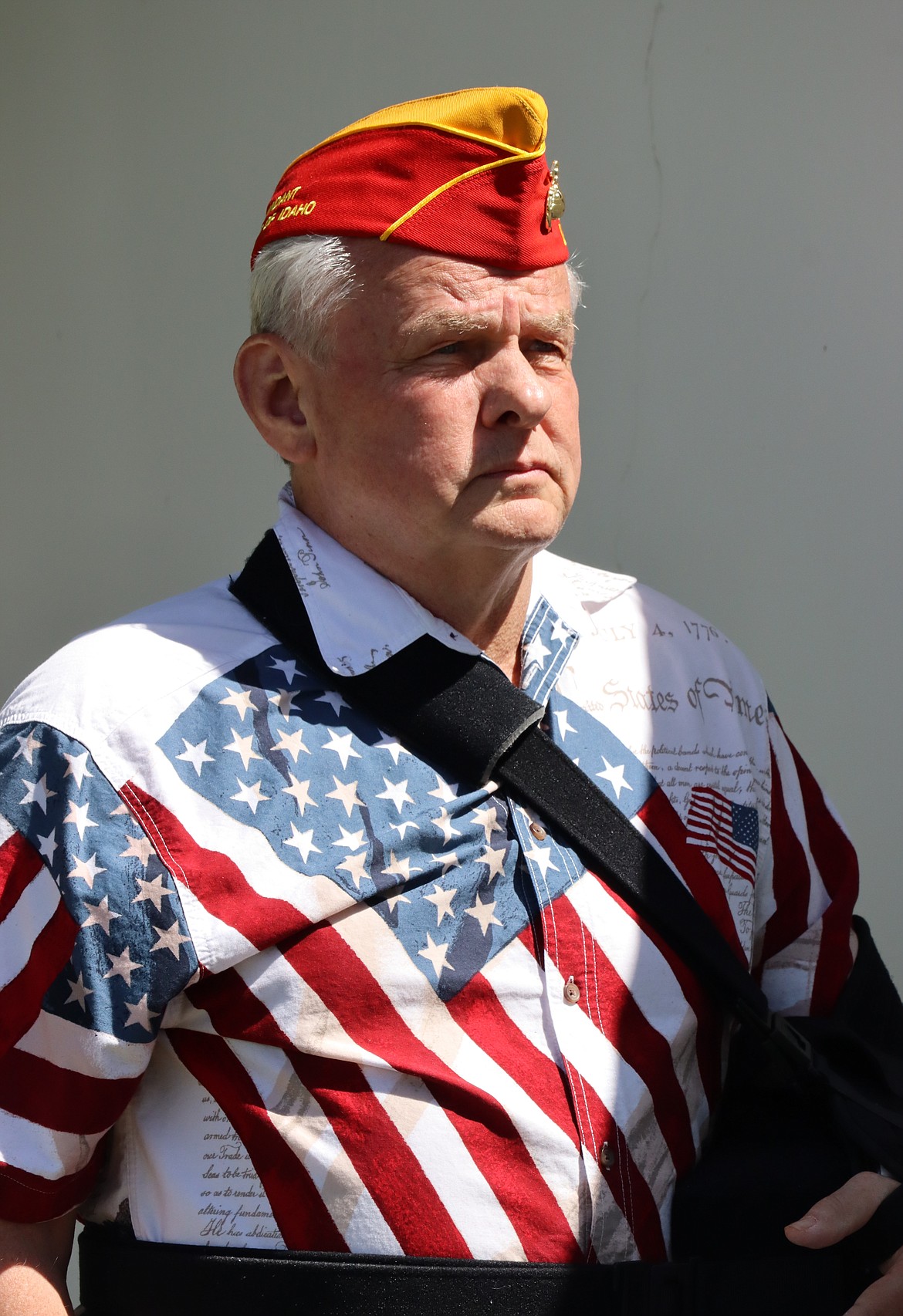 Veteran Michael Quinn watches a Memorial Day ceremony at Coeur d'Alene Memorial Gardens.