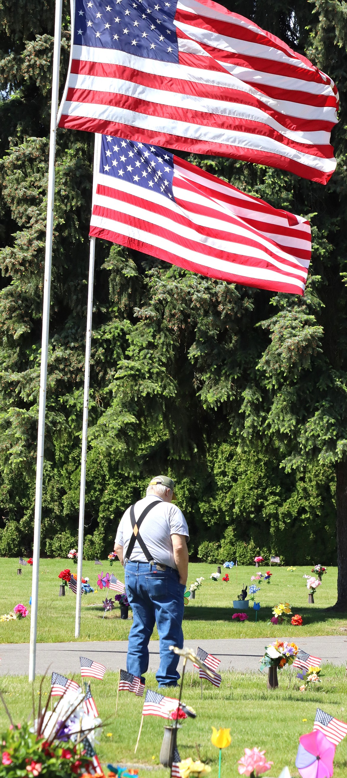 Veteran Bill Turner visits Coeur d'Alene Memorial Gardens on Monday.