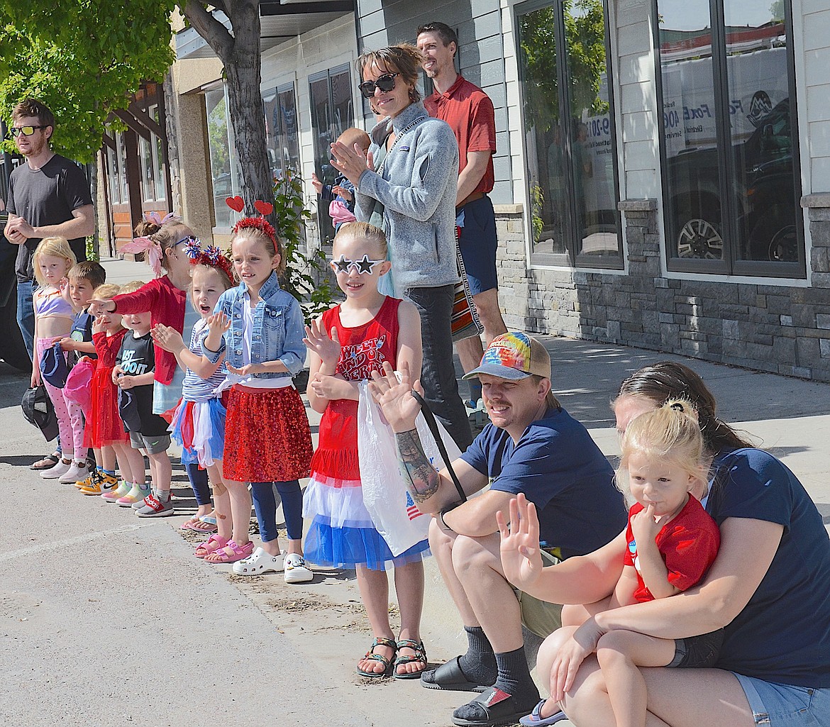 A small, but patriotic audience gathered on Main Street in Polson Monday to watch the Memorial Day procession travel through town. (Kristi Niemeyer/Leader)