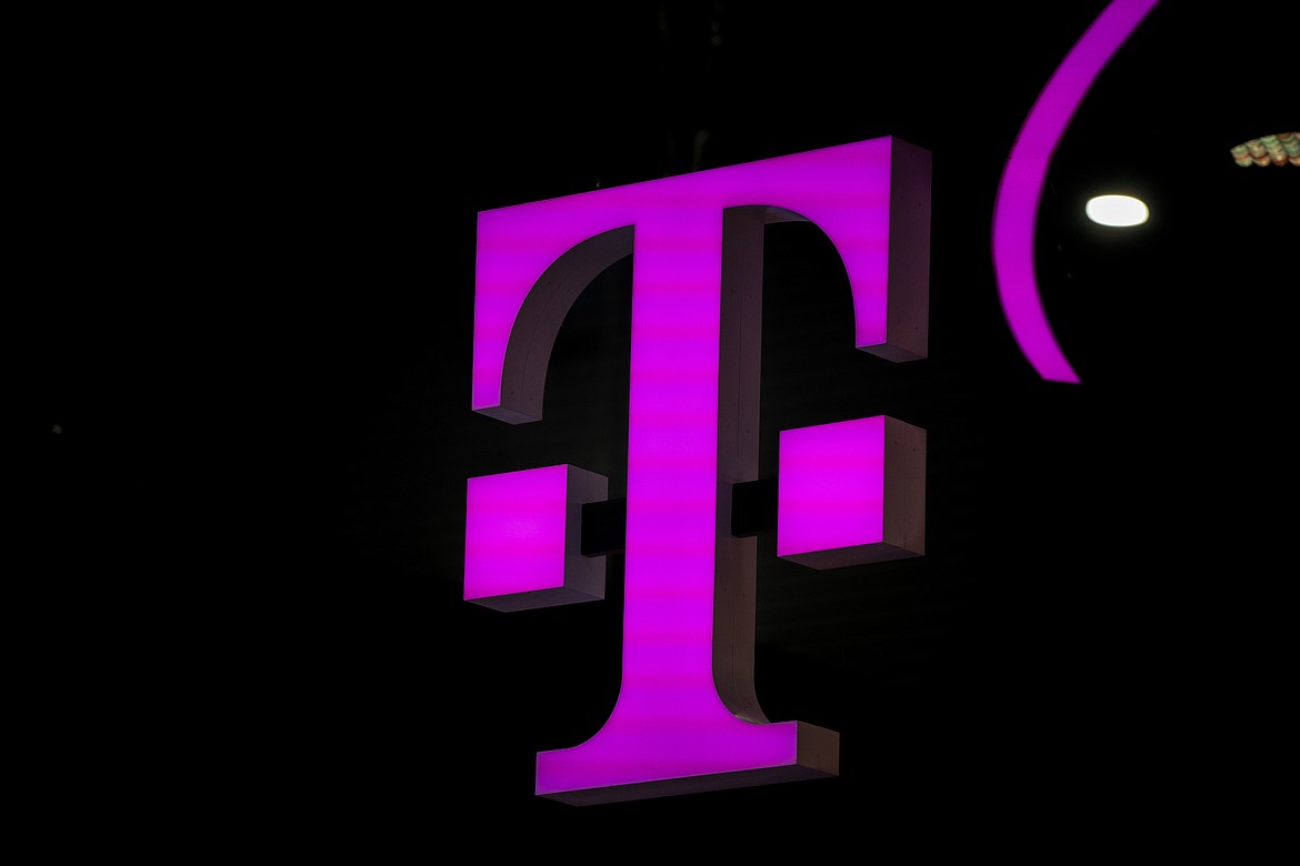 T-mobile logo in the Mobile World Congress 2023 in Barcelona, Spain, on Thursday, March 2, 2023. On Tuesday, May 28, 2024, T-Mobile is buying U.S. Cellular's wireless operations and certain spectrum assets in a deal valued at $4.4 billion. (AP Photo/Joan Mateu Parra, File)