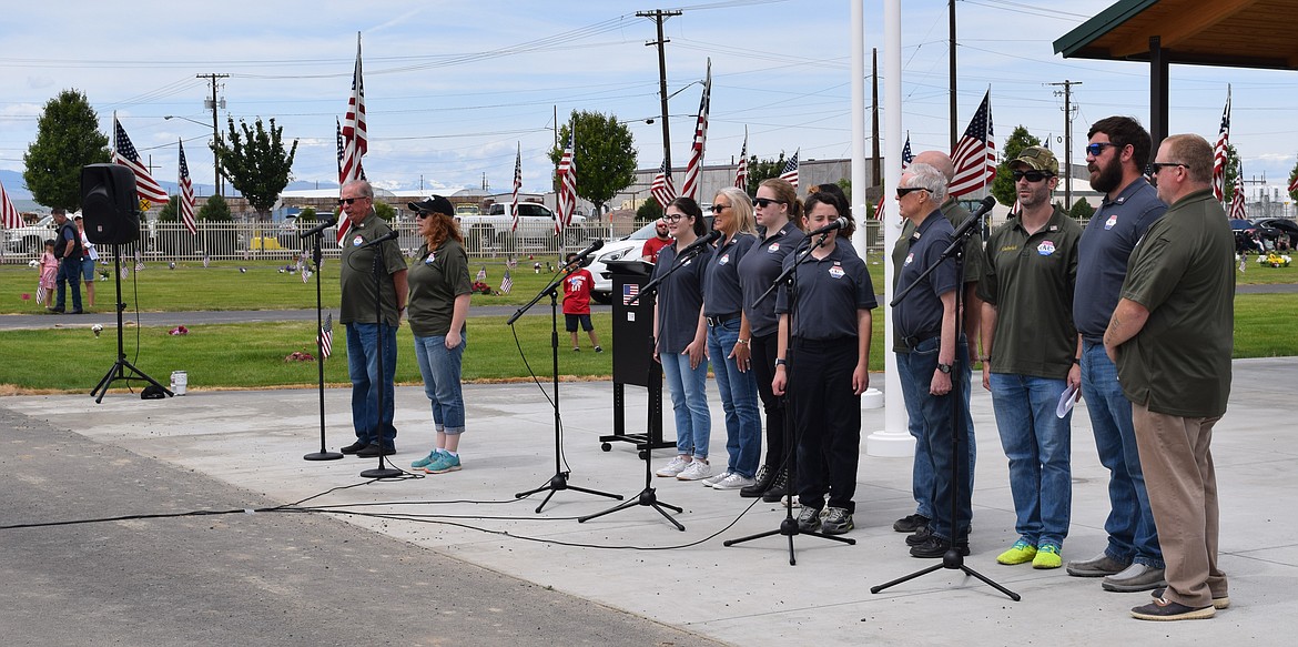 Veterans Operation Creation choir members sing during the Quincy Memorial Day observances on Monday. The group sang multiple times, including performances of the National Anthem and Lee Greenwood’s “God Bless the U.S.A.”