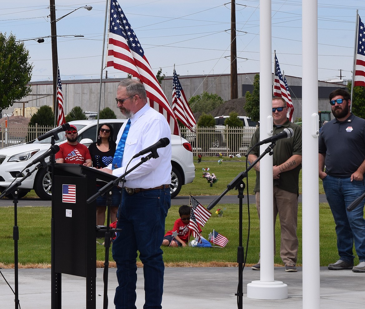 Quincy agriculture teacher Rod Cool speaks during the Memorial Day observance in Quincy. Cool recently lost his wife, a veteran, and this was his first Memorial Day observing her service to the U.S.