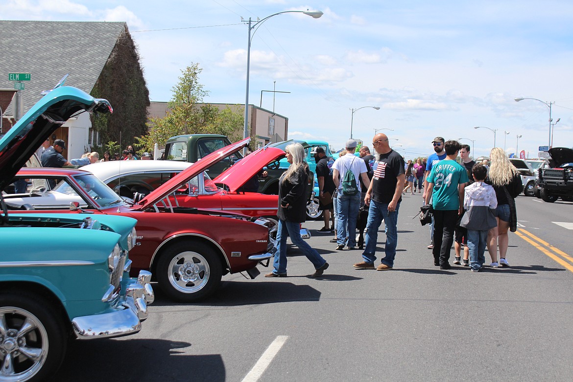 The Spring Festival car show drew more than 200 cars and filled the street with spectators.