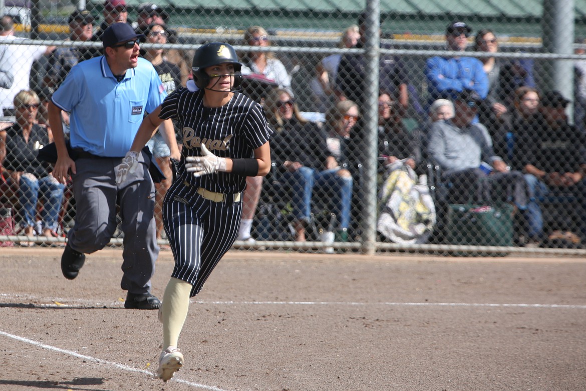 Royal junior Lily Delarosa dashes to first base after making contact with a pitch against Cedar Park Christian in the 1A semifinals on Saturday. In Saturday’s state title game, Delarosa had a bases-clearing three-RBI triple in the top of the sixth inning.