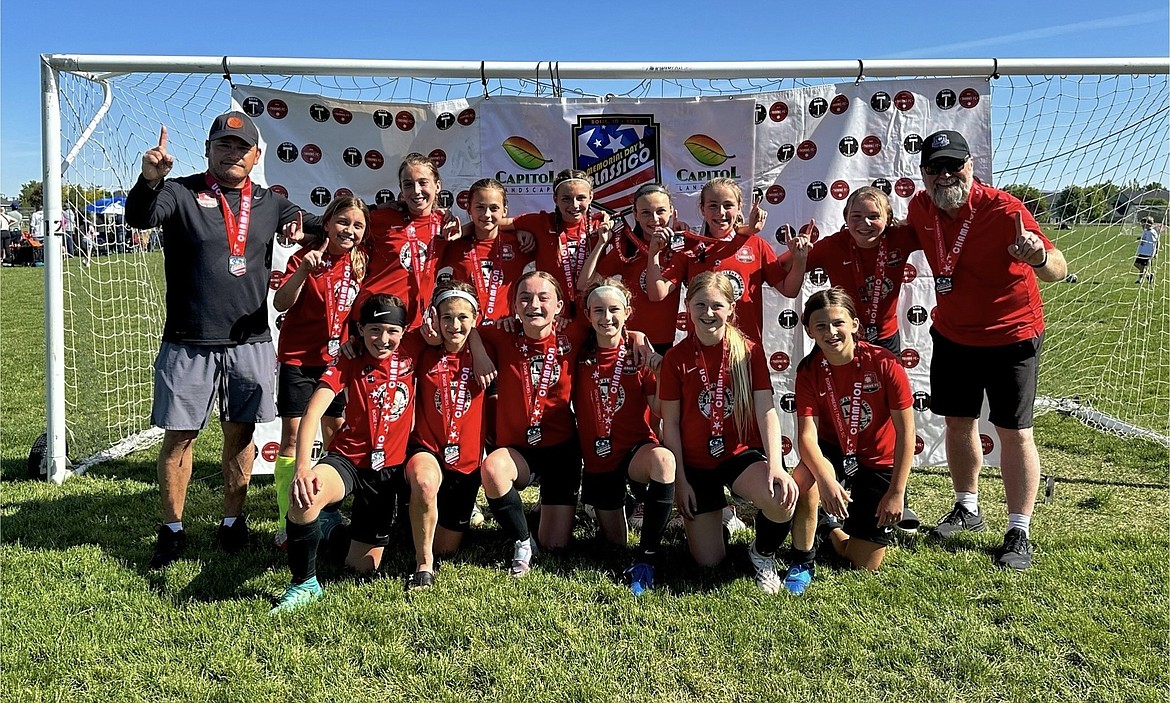 Courtesy photo
The Thorns 2013 girls soccer team took first place at the Memorial Day Classico tournament in Boise, scoring 18 goals in 4 games. In the front row from left are Emma Storlie, Presley Hart, Peyton Cantrell, Kinsley May, Kaylee Evans and Felicity Miller; and back row from left, head coach Tomas Barrera, Nora Snyder, Kyal Carlson, Hayden Hays, Addison Salas, Nevie Sousley, Nora Schock, Vera Eveland and assistant coach Gary Evans.