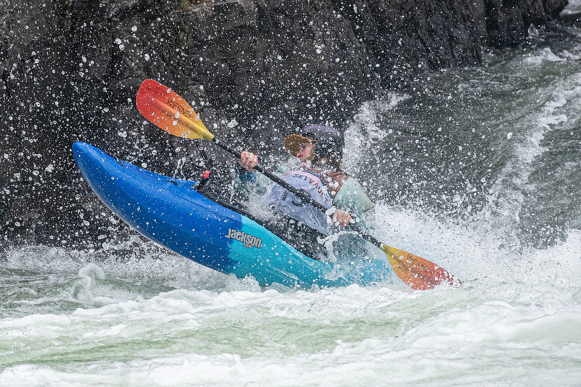 A kayaker competes in giant slalom at the Bigfork Whitewater Festival Sunday, May 26. (Avery Howe/Bigfork Eagle)