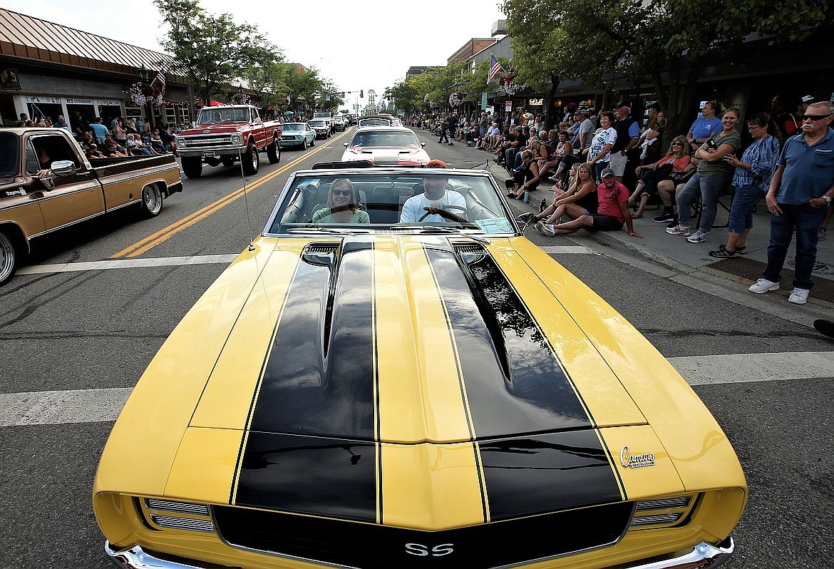 Chris and Sandy Leonard cruise up Sherman Avenue in their 1969 Camaro during Car d'Lane 2023.