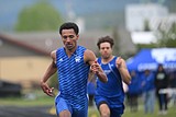 Simpson breaks 2 records, boys take 2nd
