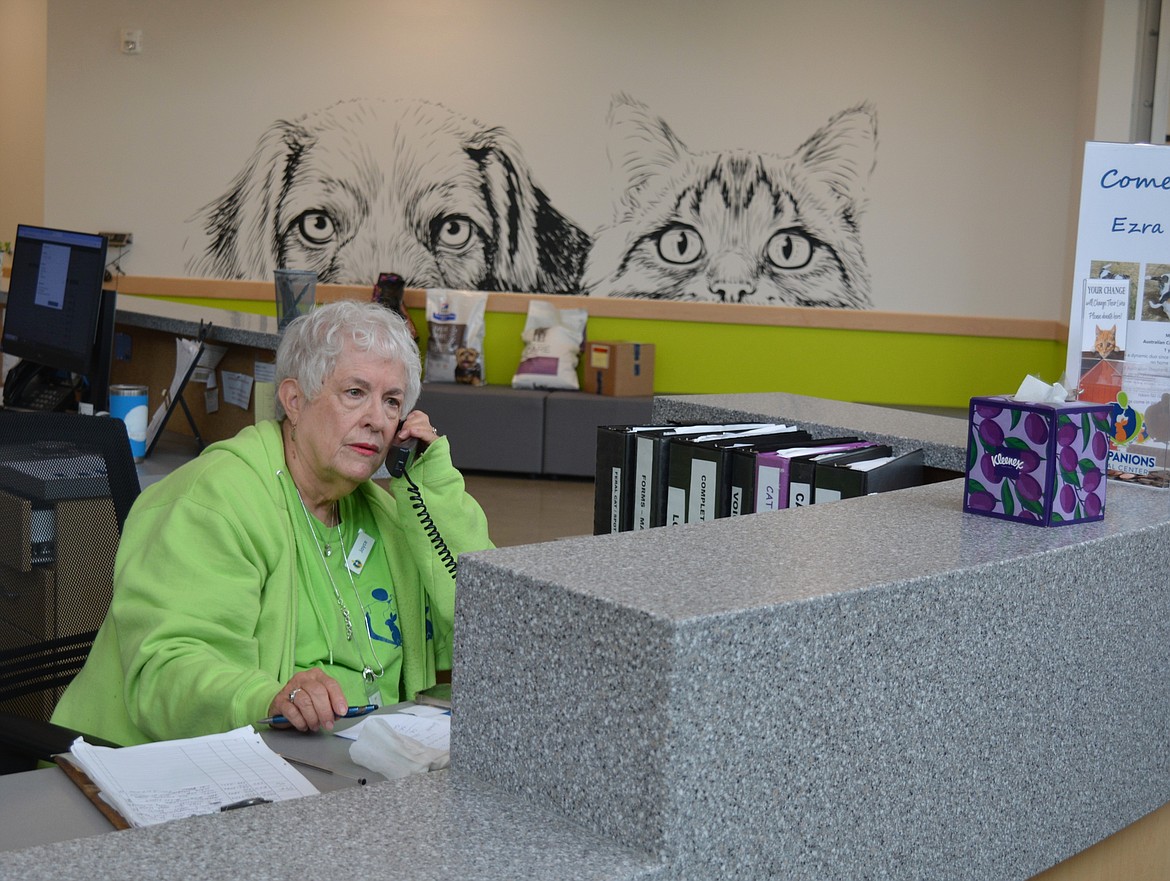 Joyce Crettol volunteers at Companions Animal Center and tries to impart comfort to each visitor.