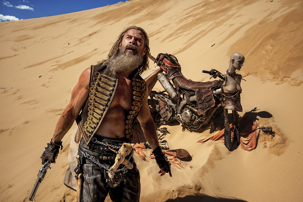 This image released by Warner Bros. Pictures shows Chris Hemsworth in a scene from "Furiosa: A Mad Max Saga."