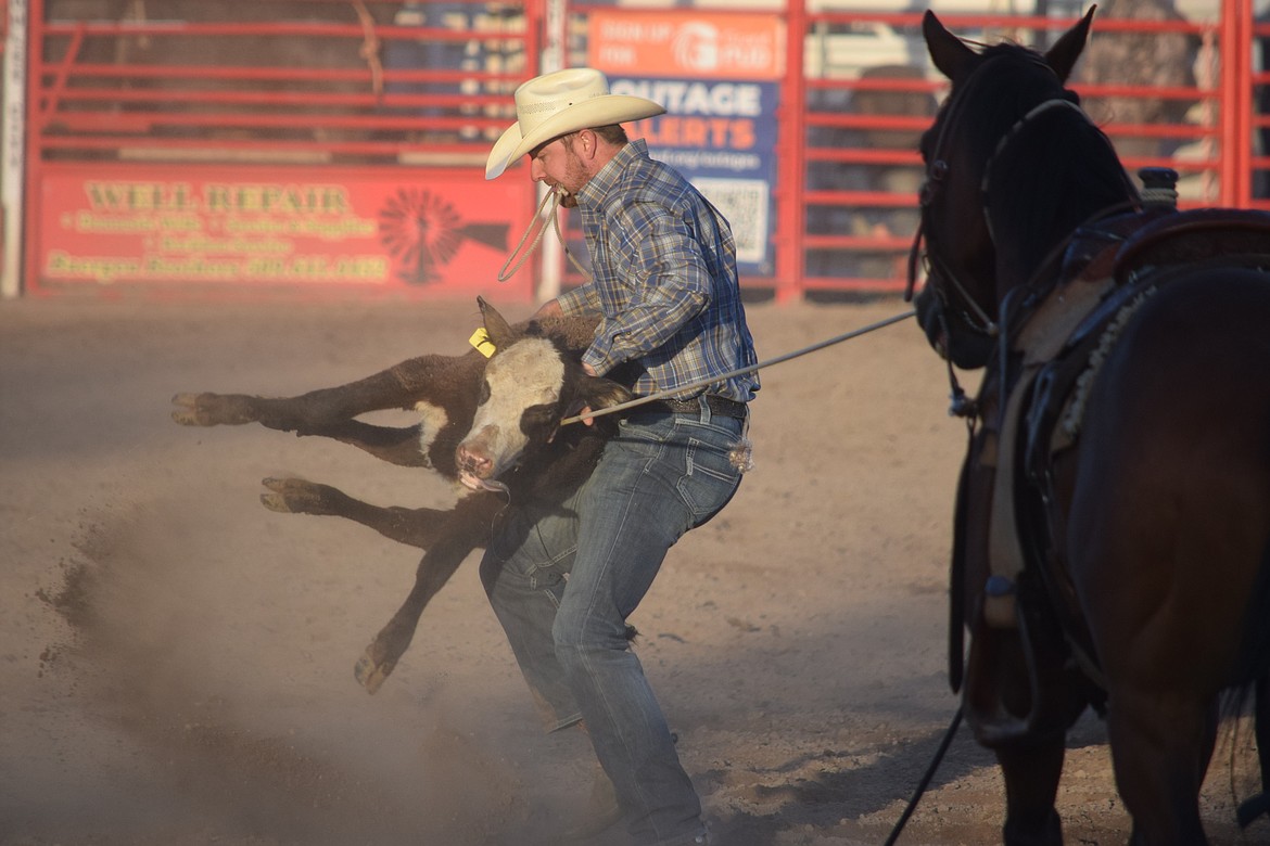 Luke Potter of Maple City, Kansas competes Saturday at the Coulee City Last Stand Rodeo in the tie-down roping event. Potter also placed third in the team roping competition, alongside partner Cody Craig, with a time of 8 seconds.