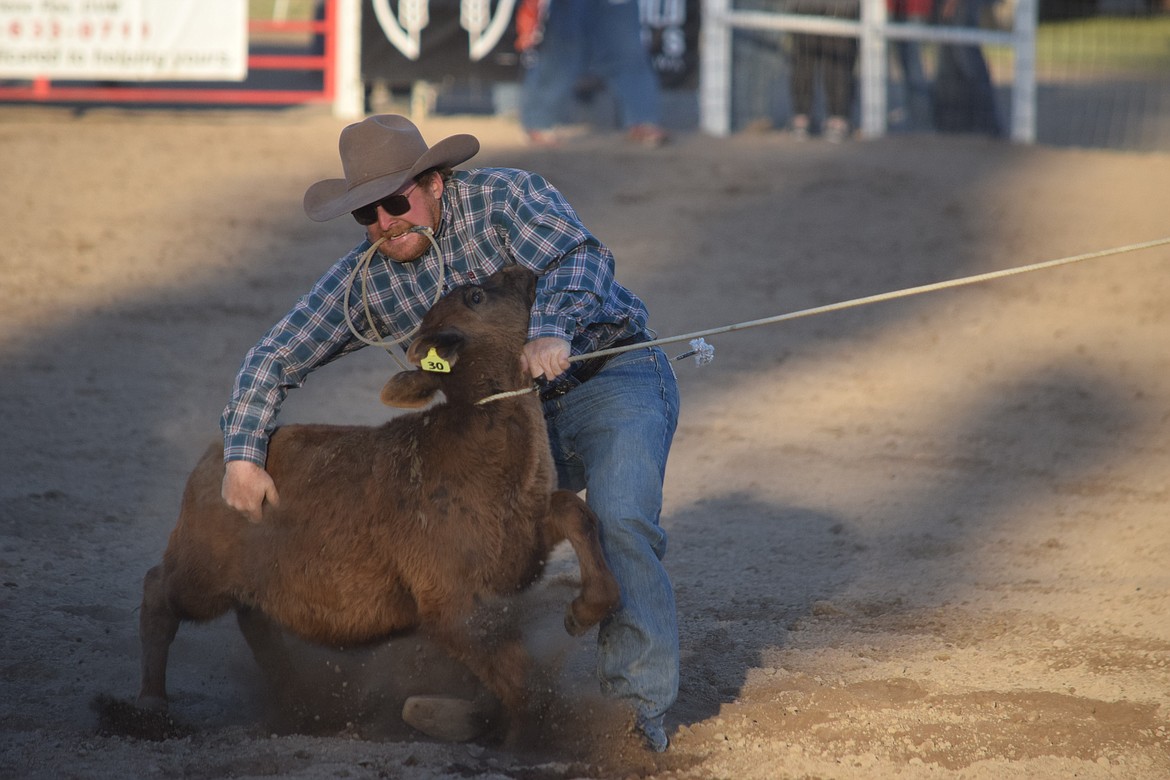 Tim Messner of Terrebonne, Oregon, competes in the tie-down roping event Saturday in Coulee City’s Last Stand Rodeo.