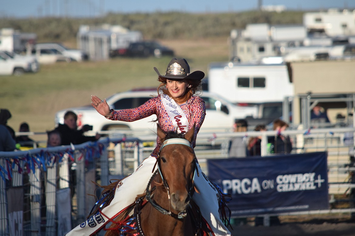 2024 Last Stand Rodeo and Coulee City Rodeo Association Rodeo Queen Kaylee Stump rides by the audience Saturday evening.