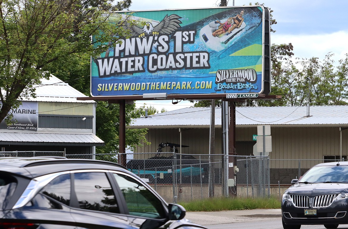 Traffic passes a billboard on Northwest Boulevard on Wednesday. Under proposed changes to the city's sign codes, the off-premises billboard could be moved.