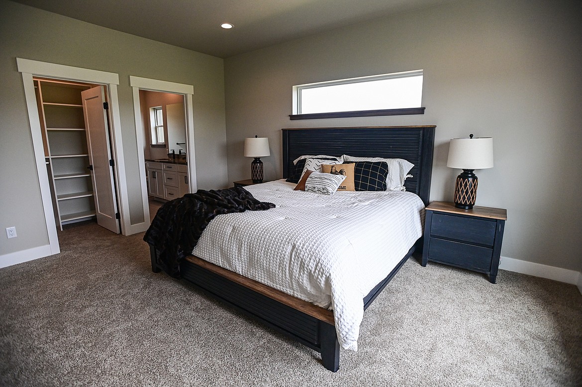 The master bedroom is shown during an open house for the latest finished home in the Kalispell Student Built Homes program at 225 Northridge Way on Wednesday, May 15. (Casey Kreider/Daily Inter Lake)