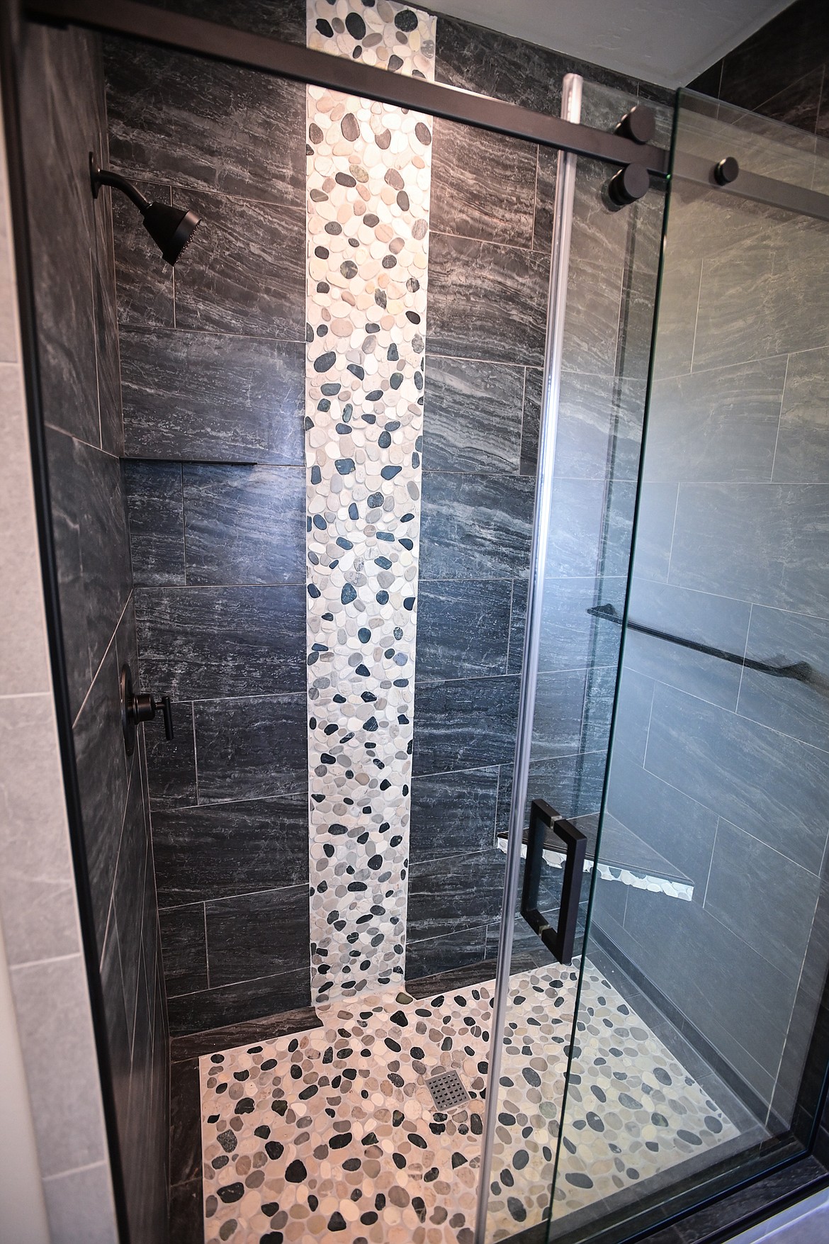 The shower inside the master bathroom is shown during an open house for the latest finished home in the Kalispell Student Built Homes program at 225 Northridge Way on Wednesday, May 15. (Casey Kreider/Daily Inter Lake)