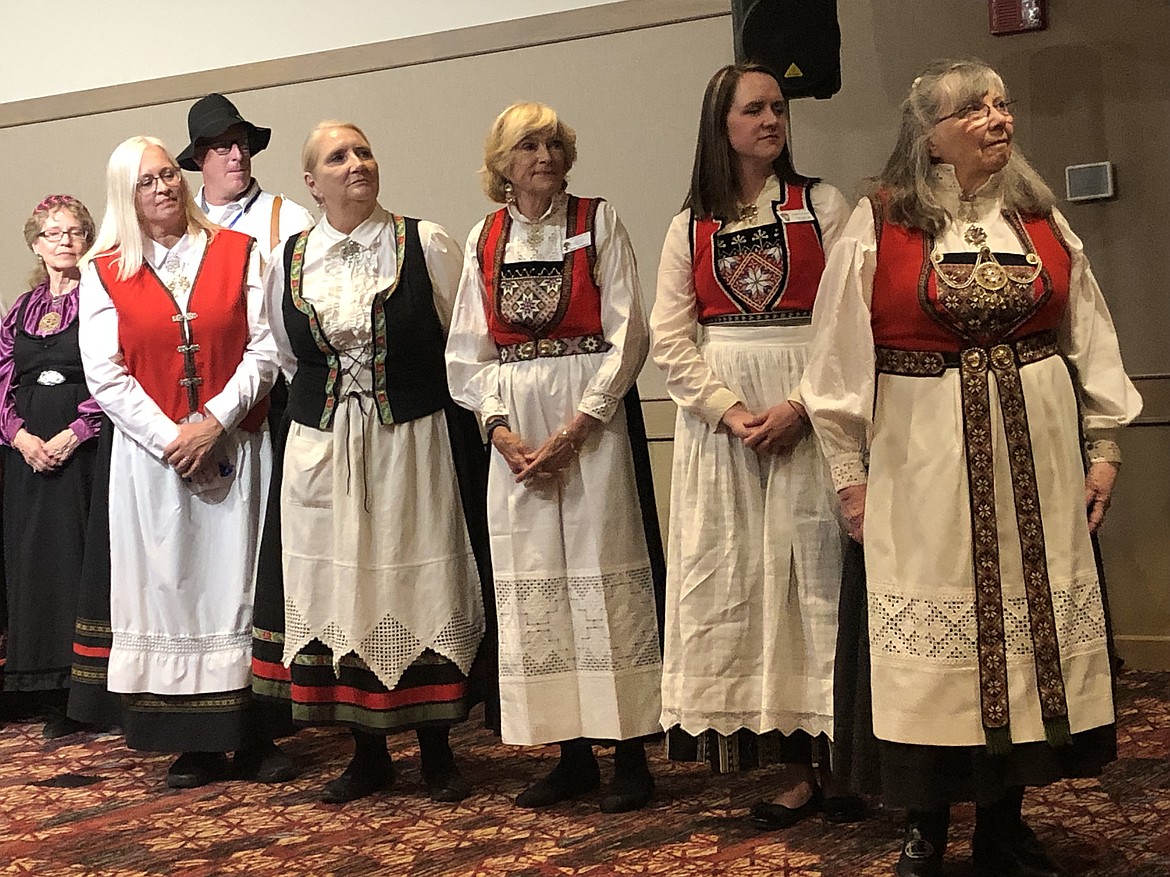 Parade participants wear Bunads, hand embroidered, traditional clothing from many areas in Norway, during the Sons of Norway gathering in Coeur d'Alene this week.