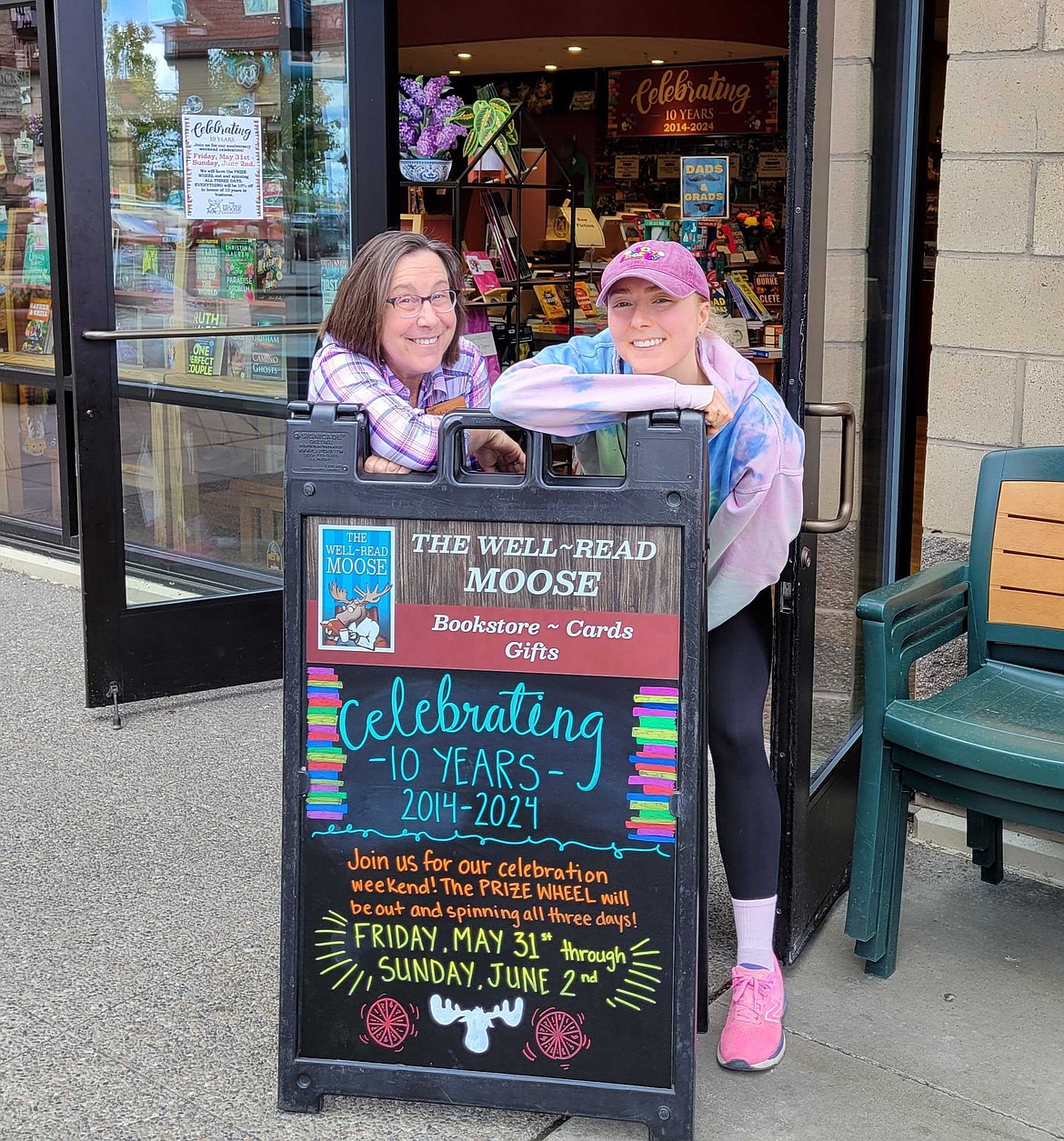 An exciting weekend is planned for the Well-Read Moose as it celebrates its 10th anniversary. Pictured, from left: Owner Melissa DeMott and marketing assistant Anna Rose Carleton.