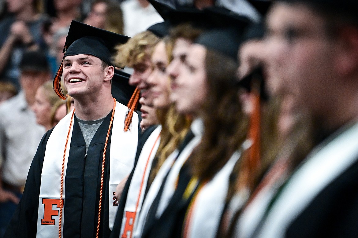 Anders Thompson smiles to the crowd as graduates take their seats during Flathead High School's class of 2024 graduation ceremony on Friday, May 31. (Casey Kreider/Daily Inter Lake)