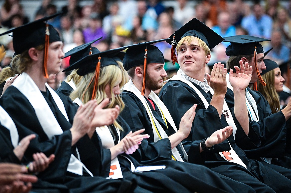 Graduates applaud a musical performance during Flathead High School's class of 2024 graduation ceremony on Friday, May 31. (Casey Kreider/Daily Inter Lake)