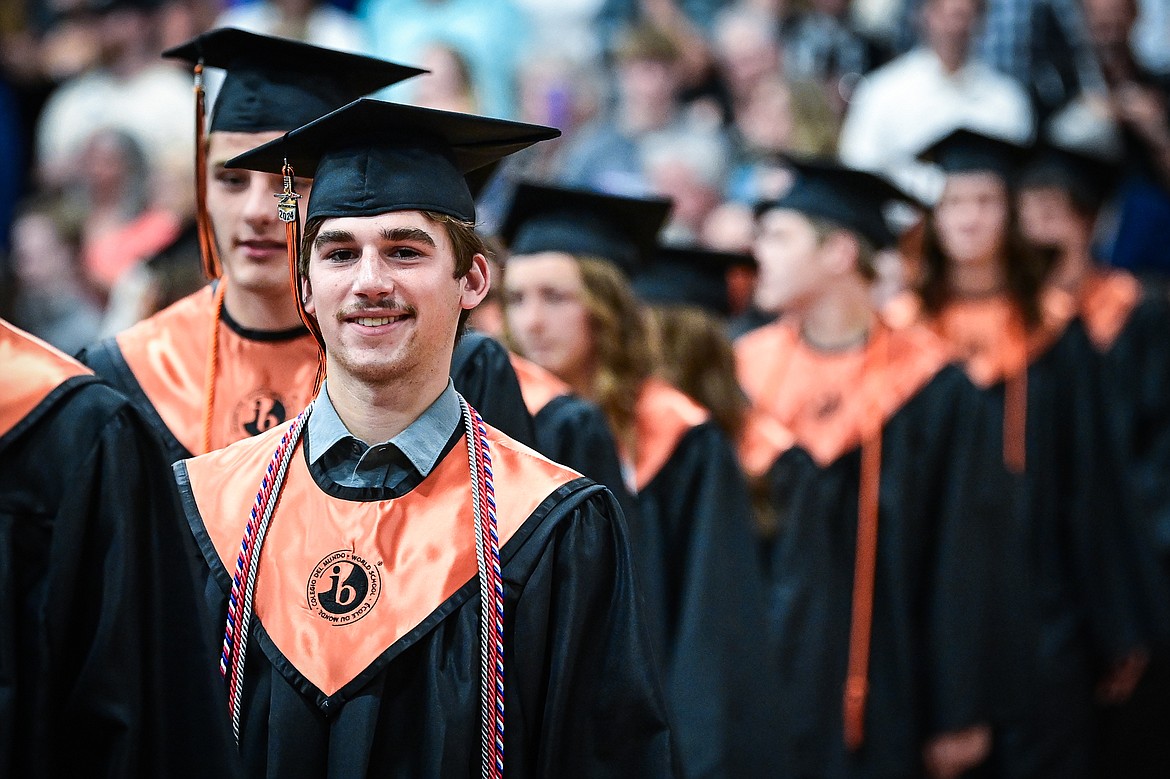 Graduates file into the gymnasium during Flathead High School's class of 2024 graduation ceremony on Friday, May 31. (Casey Kreider/Daily Inter Lake)