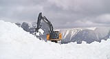 Glacier National Park plows at Big Drift, construction paving done on lower end of Sun Road, though shoulder work continues