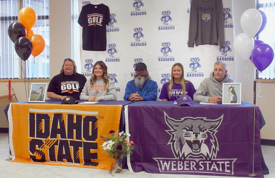 This past winter, Bonners Ferry High twin sisters Avery and Braylyn Bayer both signed to play collegiate golf for different Big Sky Conference programs. Avery signed to play for Idaho State University while Braylyn signed to play for Weber State University. The two helped lead the Badgers to two 3A state titles (2021 and 2023) and two state runner-up finishes (2022 and 2024). Every single year since their freshman years, the duo has placed among the top five at the 3A state tournament. Braylyn finished her career with two 3A individual state titles (2023 and 2024). Avery’s top finish was in 2023, where she placed third at the state tournament. As for the 3A Intermountain League, the pair have led the Badgers to four straight district titles, finishing 1-2 every single year — Braylyn is a three-time district champion, Avery a one-time district champion. Braylyn is a three-time 3A-1A North Idaho Girls Golf Athlete of the year… Avery was also nominated for the award all three years. The twins have been coached by PGA Pro Billy Bomar since they were eight years old. Follow these athletes' careers in the Daily Bee College Notebook, which is published in both the Bee and the Herald. Pictured, from left, are Jan Bayer (mother), Avery Bayer, coach Billy Bomar, Braylyn Bayer and Curt Bayer (father).