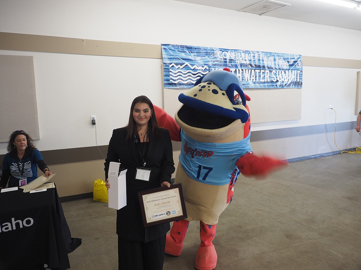 Kyla Meyer from Lake City High School accepts her award for the first annual Bob Witherow Award for Gusto. Photo courtesy of Our Gem.