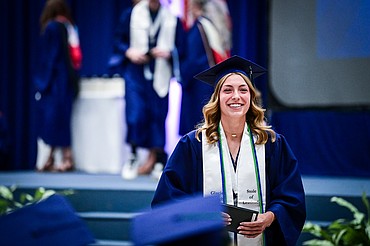 Graduate Katy Bitney smiles after receiving her diploma at the Glacier High School class of 2024 graduation ceremony on Saturday, June 1. (Casey Kreider/Daily Inter Lake)