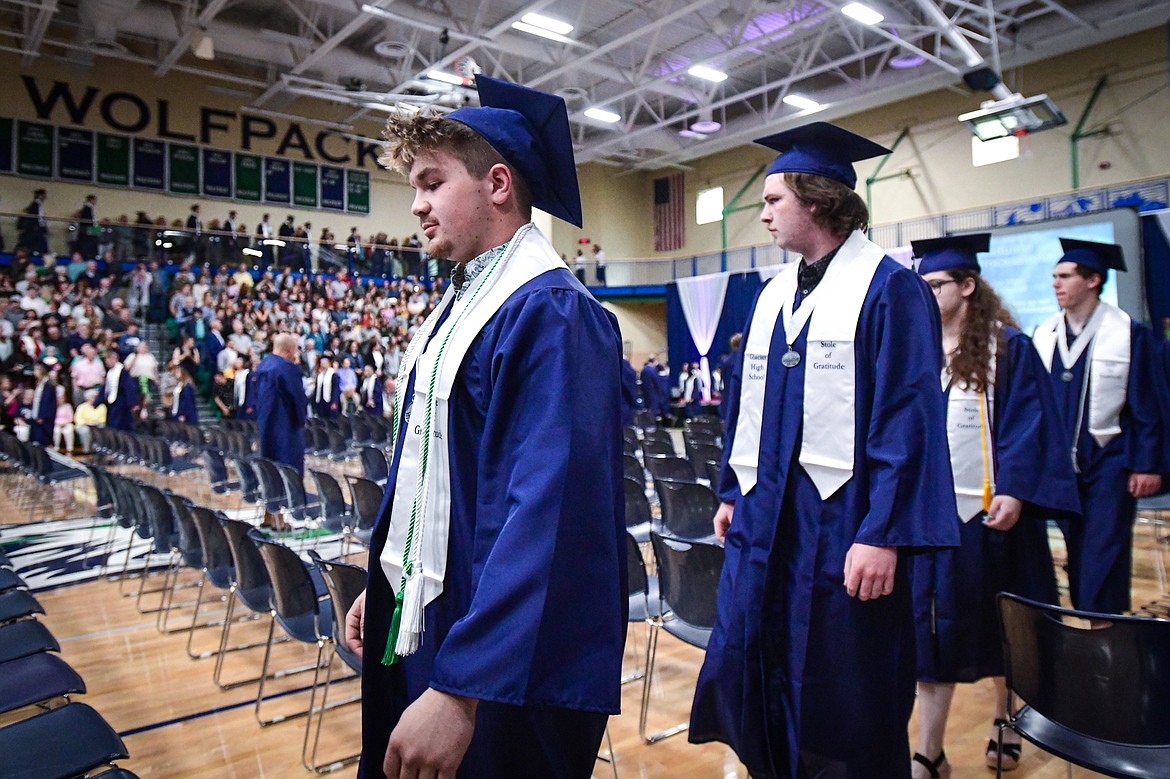 Graduates file into the gymnasium and take their seats at the Glacier High School class of 2024 graduation ceremony on Saturday, June 1. (Casey Kreider/Daily Inter Lake)