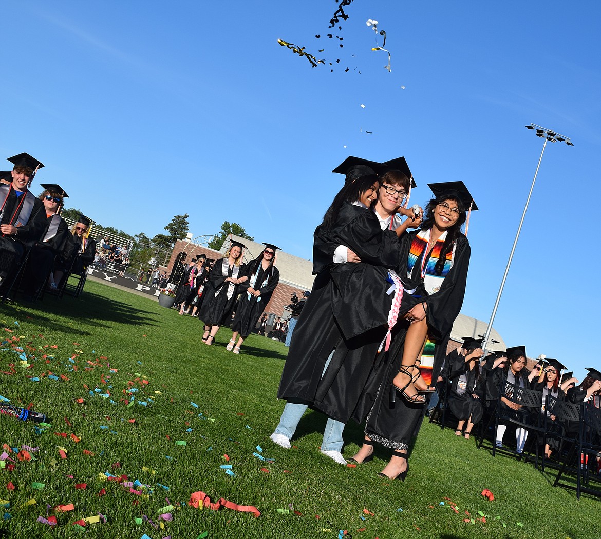 Whether it was handheld confetti cannons, backflips, wrestling moves or just being a bit sassy, each Ephrata High Grad threw out a little something special with the friends they walked onto the field with for graduation.