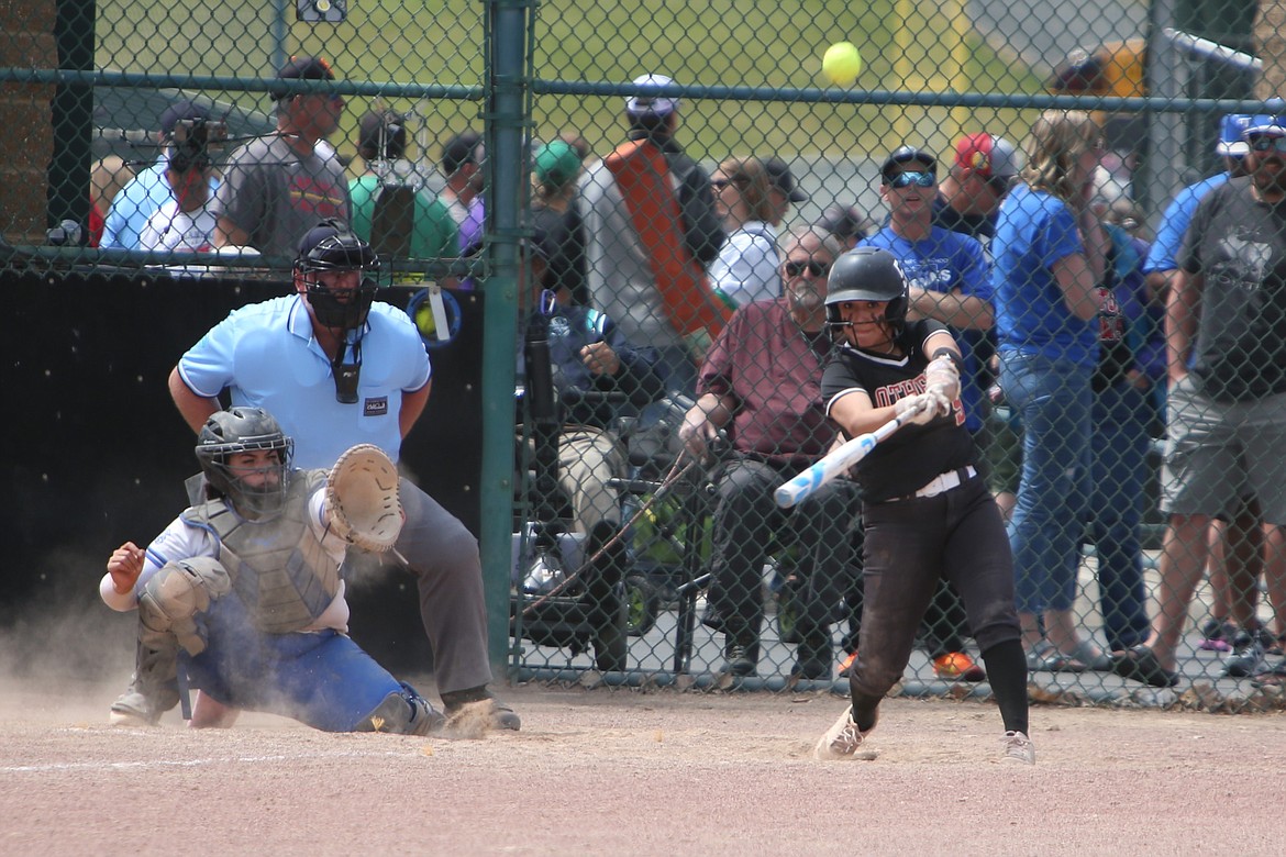 Othello junior Lovie Franco makes contact with a pitch during the opening round of the 2A State Softball Tournament against Olympic on May 24. The Huskies went 3-2 at the tournament, finishing one game shy of placing.