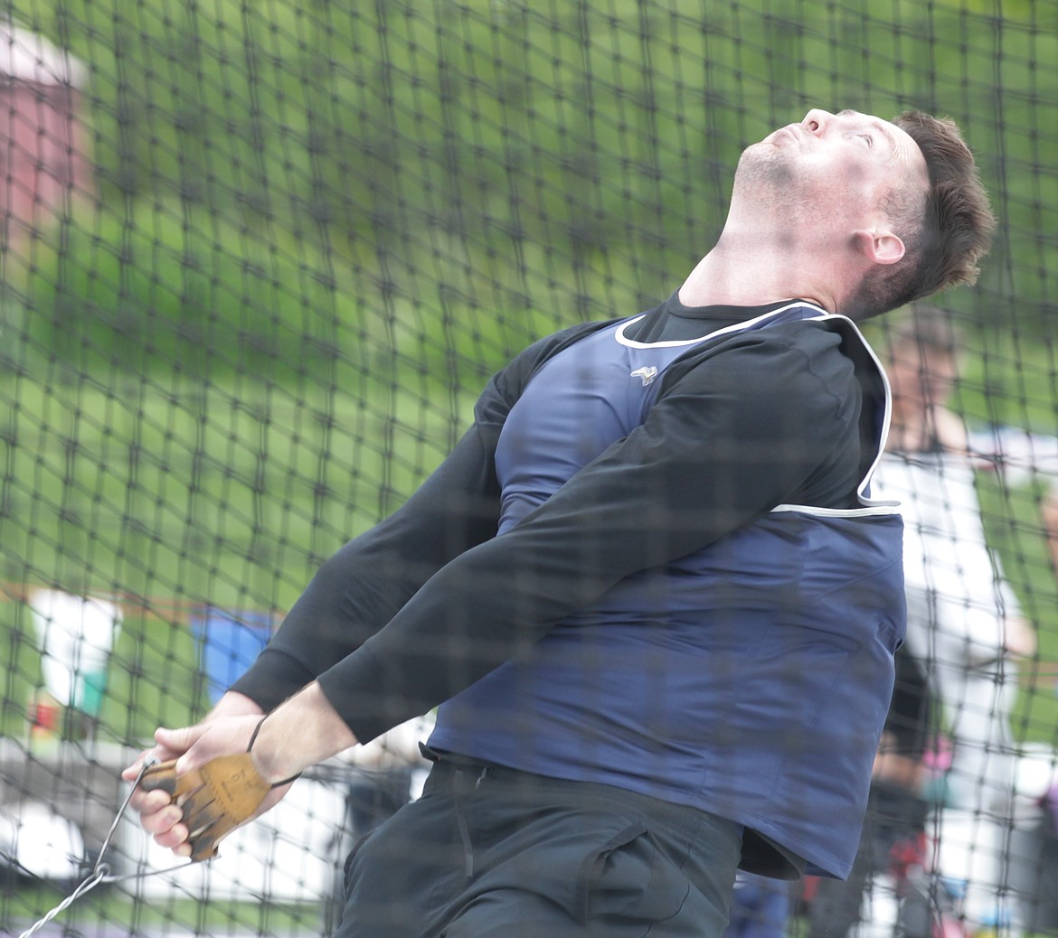 JASON ELLIOTT/Press
Justin Stafford, a 2019 UCLA graduate, makes an attempt during the men's hammer throw at the Iron Wood Throws Classic in Rathdrum on Saturday.