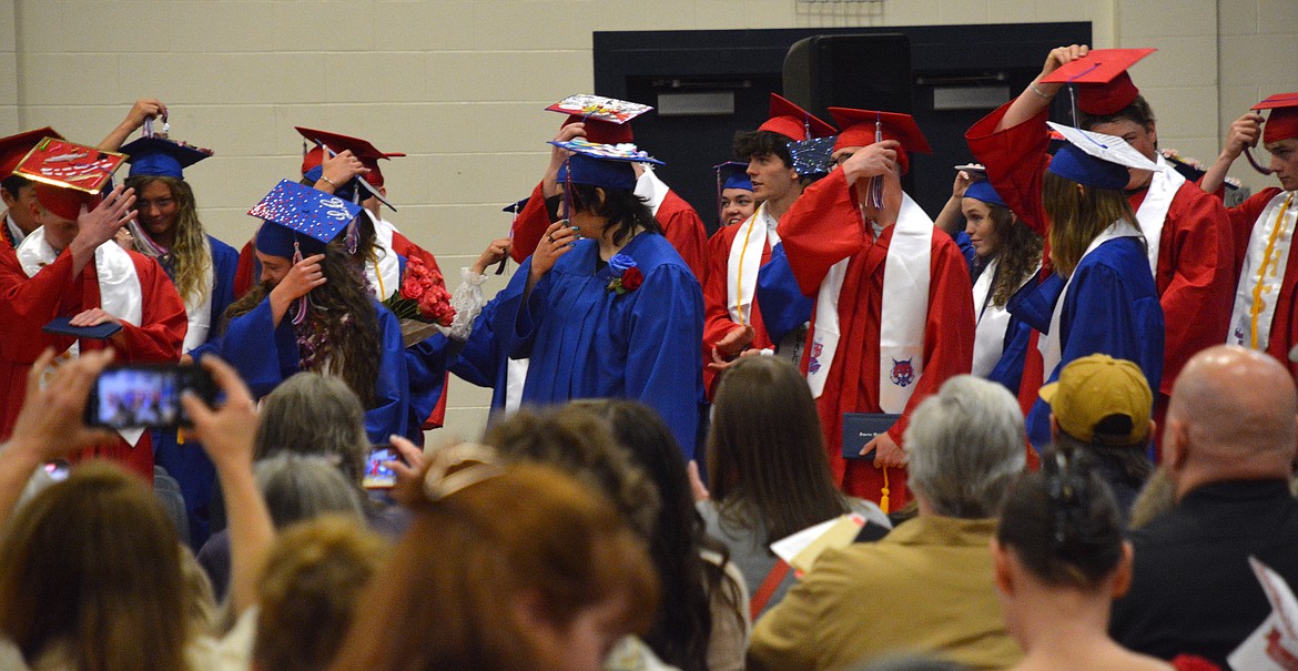 The Superior High School class of 2024 follow their last directions in unison, moving their tassels from right to left indicating the achievement of their high school diplomas last Sunday on May 26. (Mineral Independent/Amy Quinlivan)