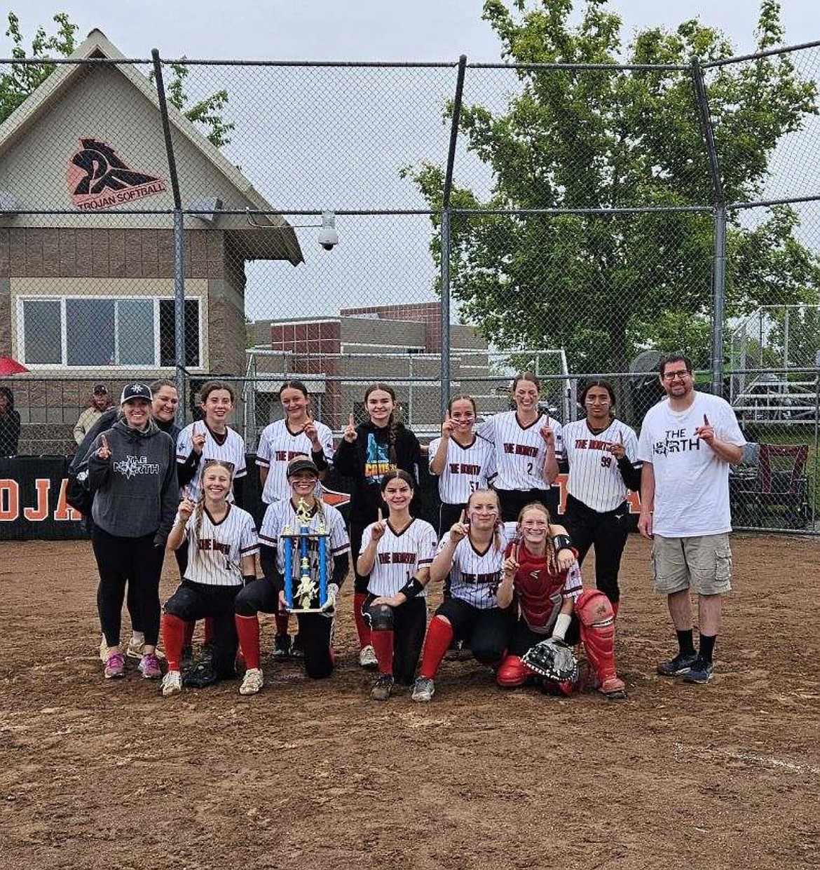 The North 14U travel softball team shows off their hardware after winning the silver bracket of the CDA Crush Invitational. Back row, from left are assistant coach Lacy Inge, coach Leah Platt, Heather Stumm, Bailey Pierson, Jennifer Petersen, Hannah Frago, Bailey Wilson, Zxyloh Johnson and head coach John Wilson. Front row, from left are Raelyn Olsen, Teagan Newsom, Taylor Bannick, Ariana Turnbull and Avery Inge.